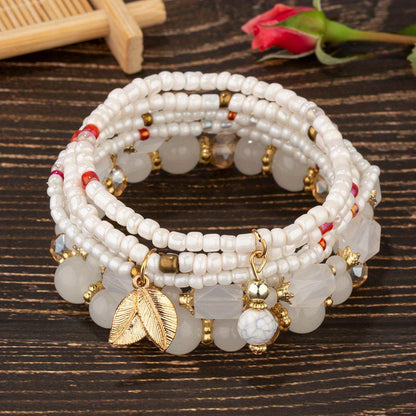 4pcs Rustic Bohemian Leaf Pendant Mens Bracelet Set - Stylish Vacation Jewelry with Adjustable Strings, Handmade Uniqueness for Trendsetters