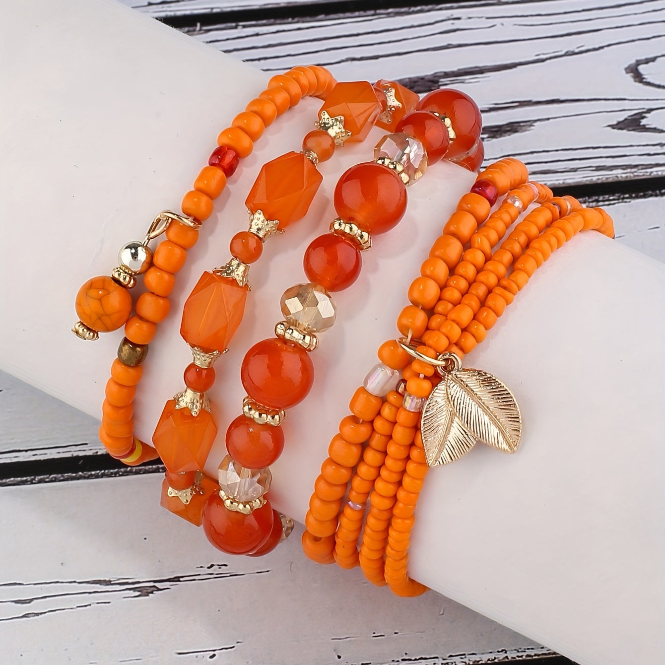 4pcs Rustic Bohemian Leaf Pendant Mens Bracelet Set - Stylish Vacation Jewelry with Adjustable Strings, Handmade Uniqueness for Trendsetters